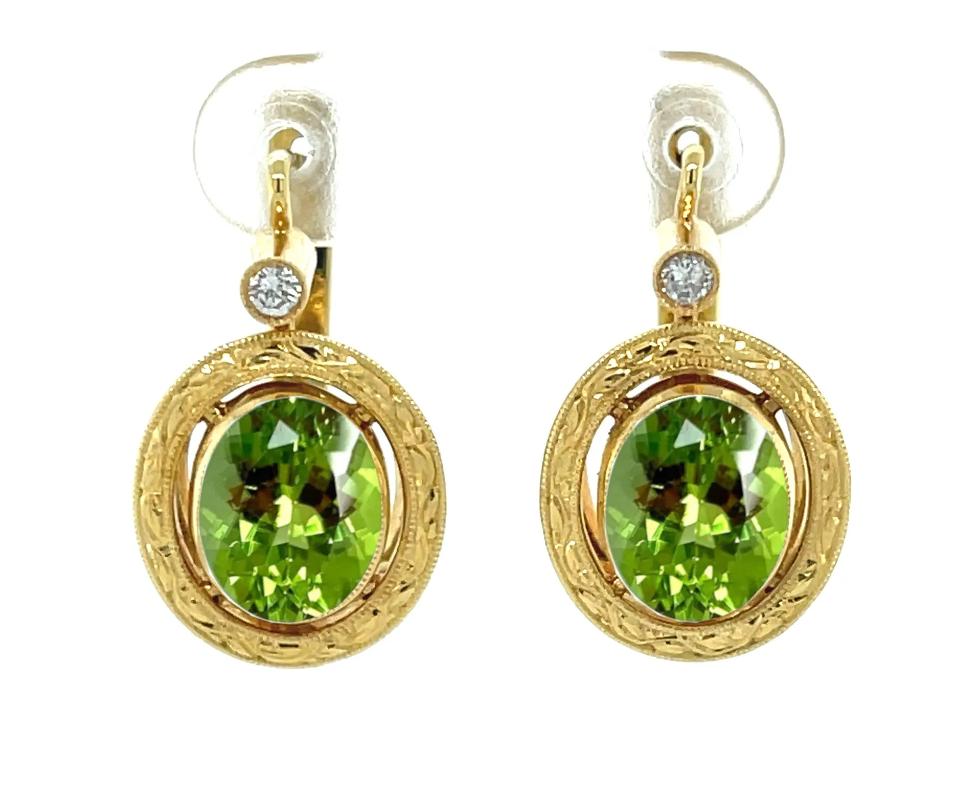 6.02 Carats Total, Pair of Apple Green Oval Peridots