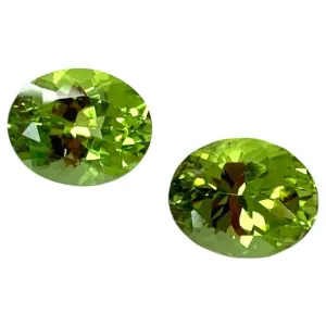 6.02 Carats Total, Pair of Apple Green Oval Peridots