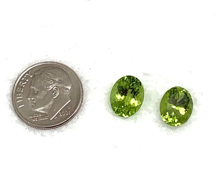6.02 Carats Total, Pair of Apple Green Oval Peridots
