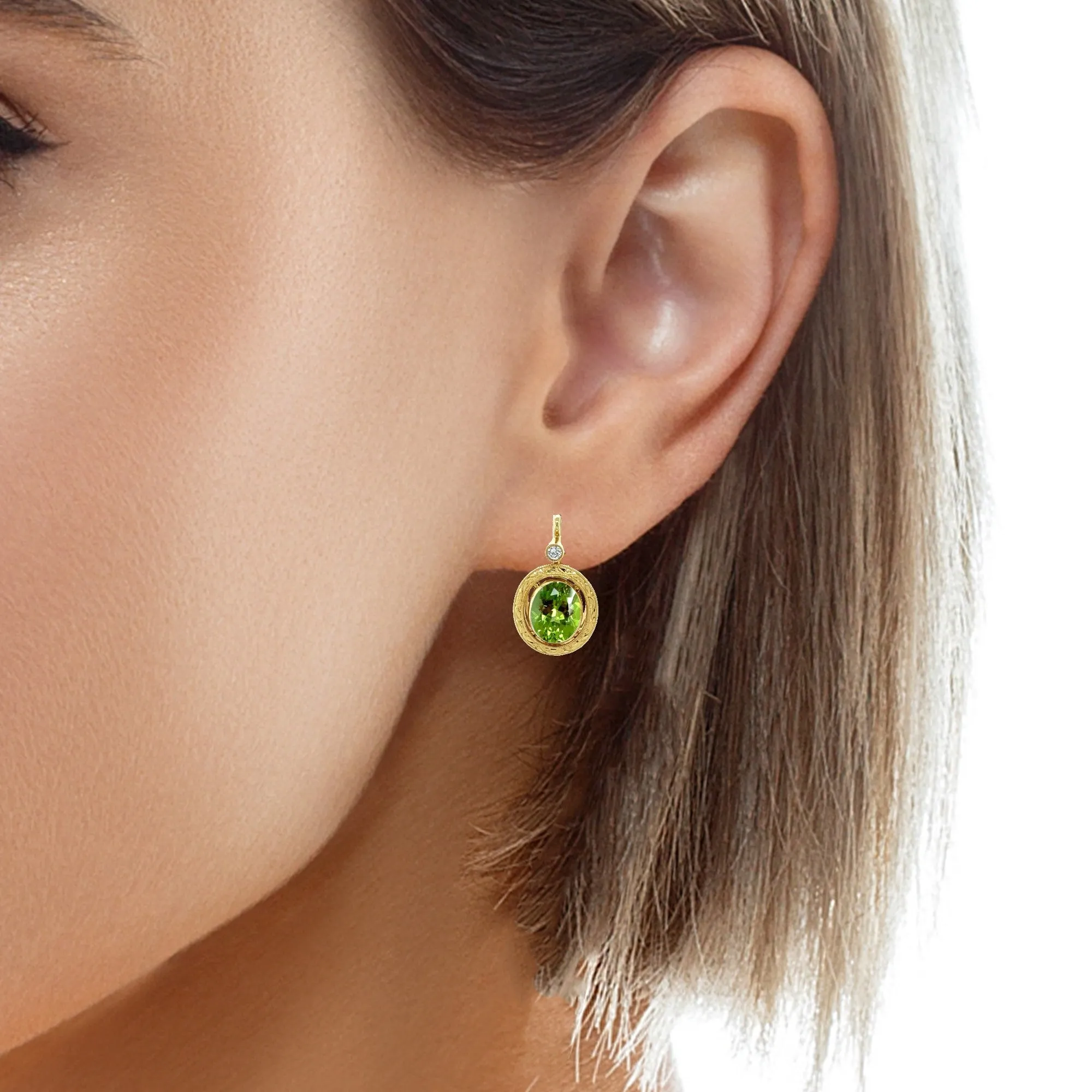 6.02 Carats Total, Pair of Apple Green Oval Peridots