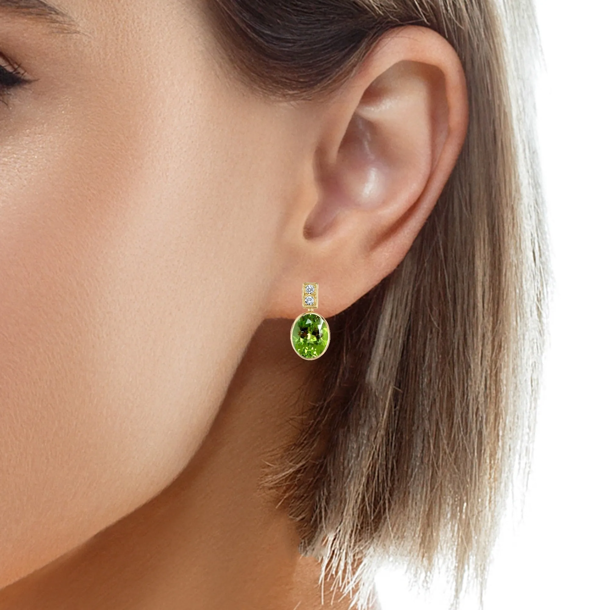 6.02 Carats Total, Pair of Apple Green Oval Peridots